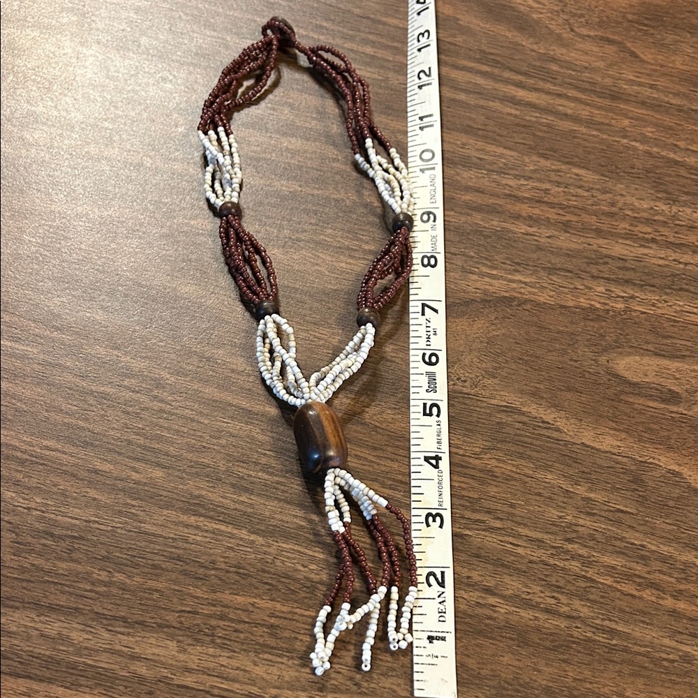 Elegant Beaded Necklace with Brown and Cream Accents